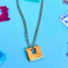 The Peach Fuzz Bread Winner Necklace^ Jewelry
